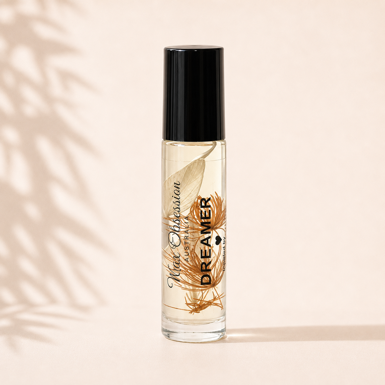 dreamer roll-on perfume | a dupe of LeLabo's Santal 33 by Wax Obsession
