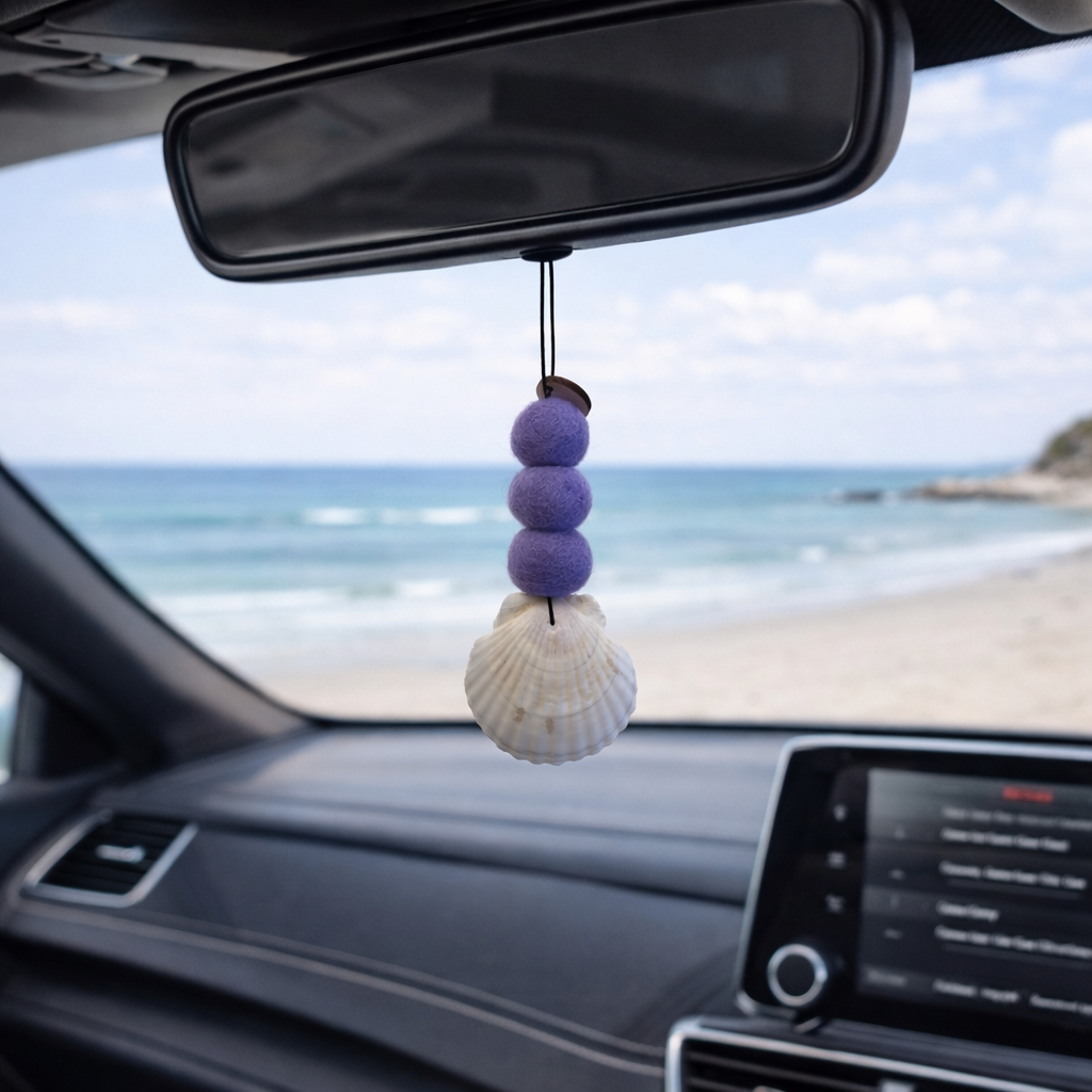 Purple coastal felt ball car diffuser with seashell (lavender tone) for a fresh, calming scent