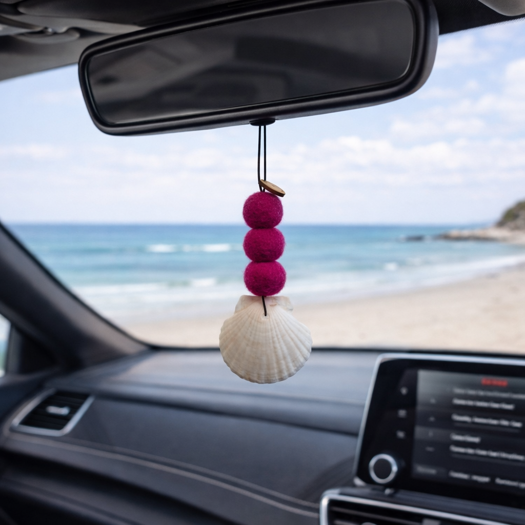 Pink coastal felt ball car air freshener with seashell for a fresh scent